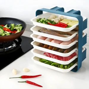 Organizador multiuso apilable para carnes y alimentos frescos, ideal para cocina.