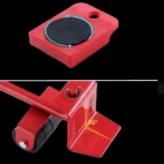 Palanca levanta muebles roja con 4 bases deslizantes y giro 90°, ideal para mover objetos pesados.