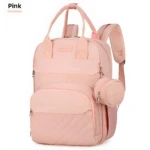 Pañalera rosa con monedero colgante y compartimento frontal acolchado.