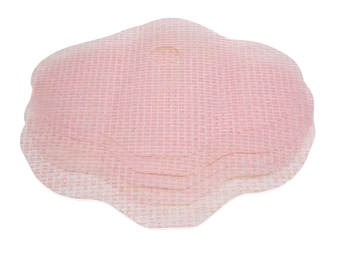 Parche abdomen rosado con textura de rejilla y borde ondulado.