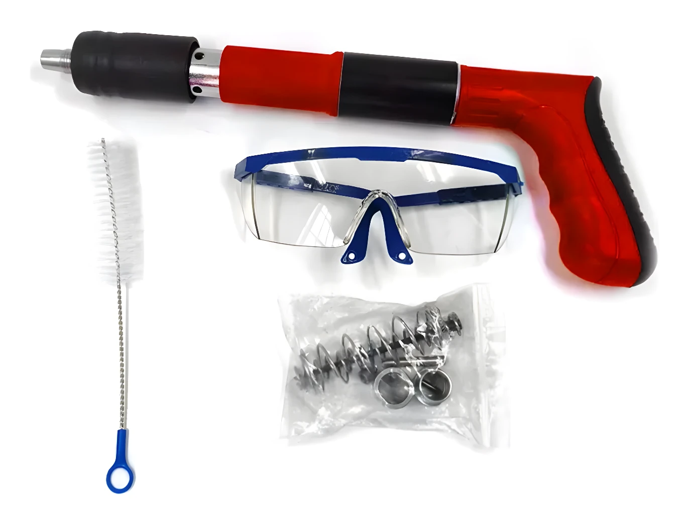 Pistola neumática para clavos de acero, incluye gafas de seguridad y repuestos.