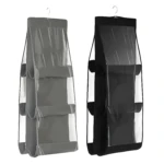 Porta bolsos colgante gris y negro con múltiples compartimentos transparentes.