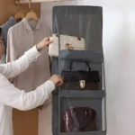 Organizador colgante de bolsos con 3 compartimentos y visibilidad clara de sus carteras de diseñador.
