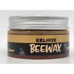 Tarro de crema reparadora de madera Bee Repair de Eelhoe con tapa plateada.