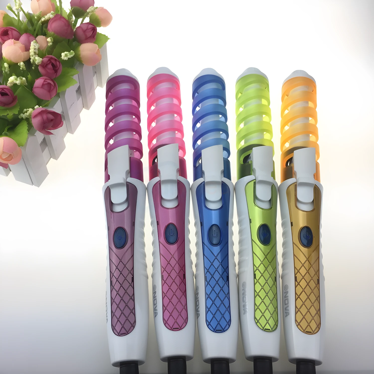 Rizador para cabello Rz-8588 en colores vibrantes: rosa, azul, verde y naranja.