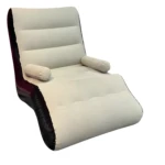Sofá inflable reclinable con reposapiés para descanso, color blanco y negro.