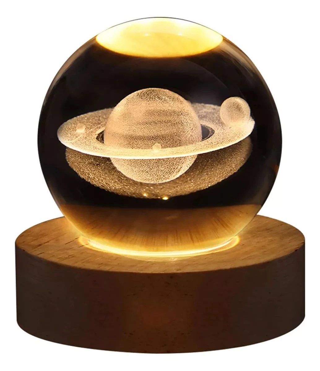 Lámpara de escritorio 3D de Saturno en cristal con base de madera iluminada.