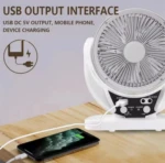 Ventilador de panel solar multifuncional blanco cargando un celular con cable USB.