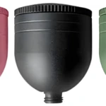 Aerógrafo portátil profesional en colores rosa, negro y verde metalizado.