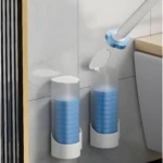 Dispensador para cepillos limpiadores de inodoro desechables con discos azules y tapa blanca.