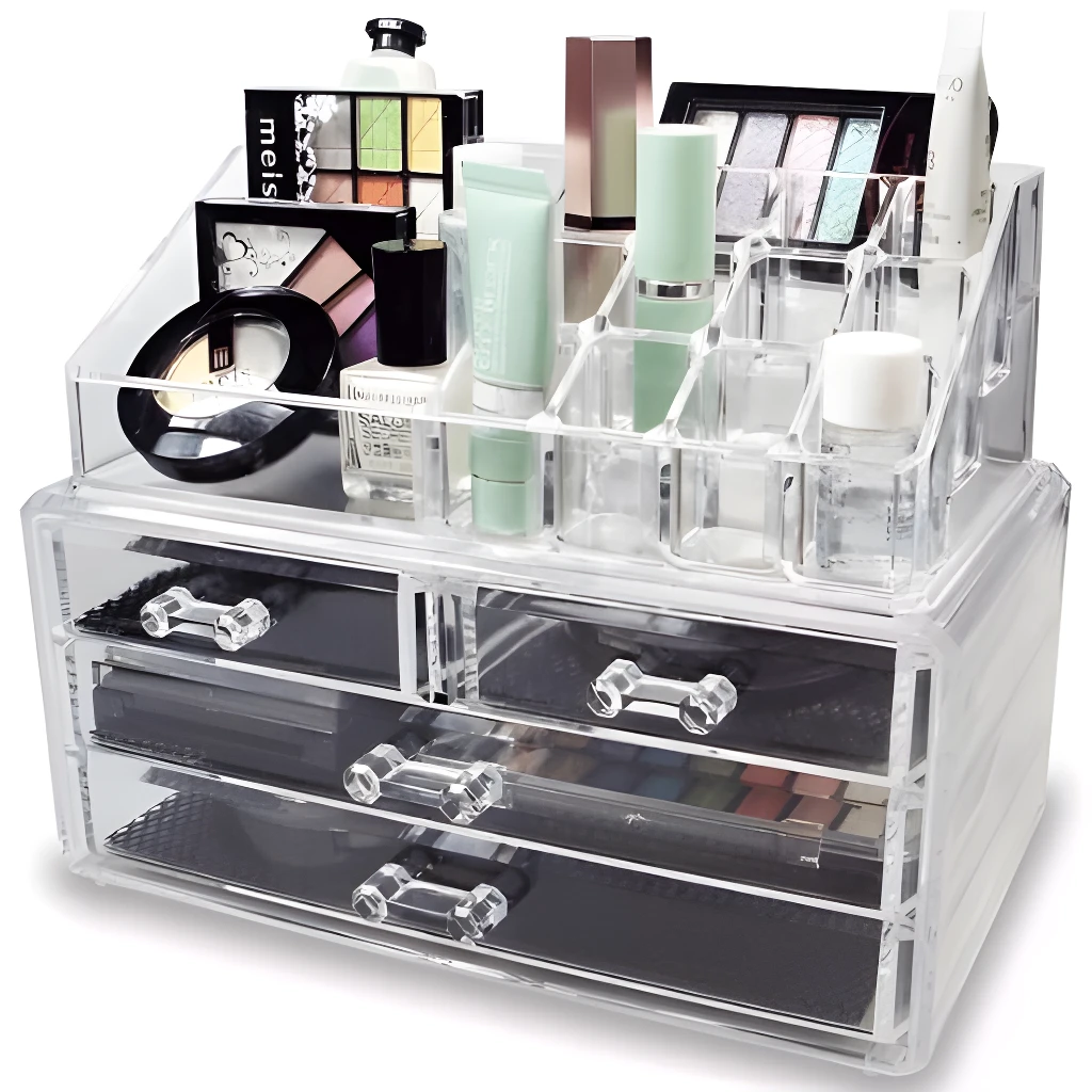 Organizador acrílico transparente con cajones y compartimentos para maquillaje, incluyendo paletas y tubos.