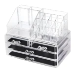 Organizador de acrílico transparente para maquillaje con 4 cajones negros y compartimentos superiores.