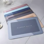 Tapete de baño antideslizante 60x40cm, color gris, varios tonos apilados.