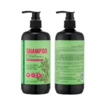 Botellas negras de shampoo Romero Mentolado 480ml con dispensador, etiqueta verde y texto blanco.