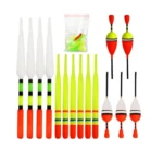 Kit de flotadores de pesca (bobbers) variados: 4 blancos/naranja, 6 amarillos/naranja, 2 rojos/amarillos y 3 blancos/naranja/negro, más bolsas de antenas.