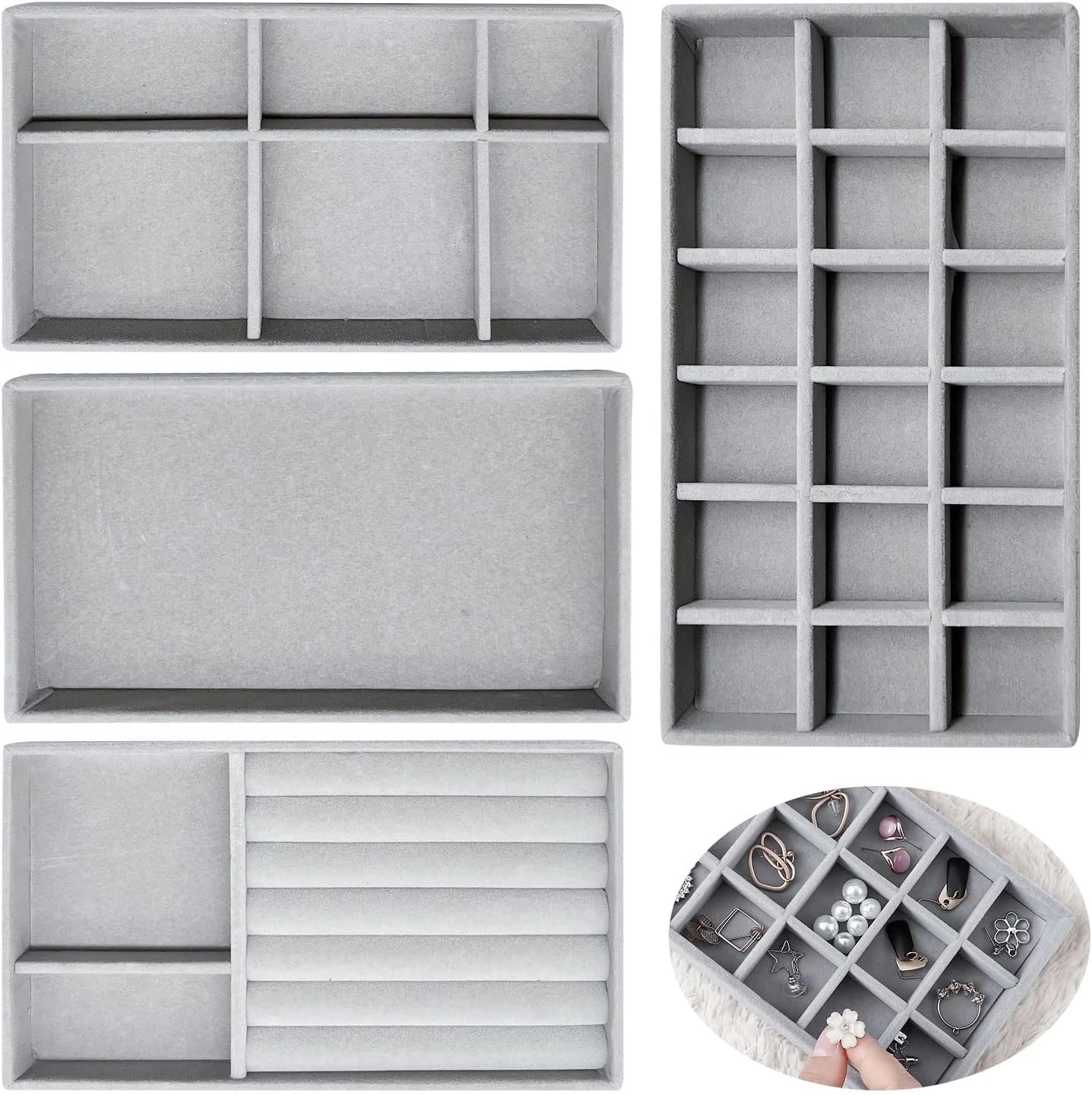 Set joyero de 4 organizadores grises de terciopelo con compartimentos para anillos y joyas.