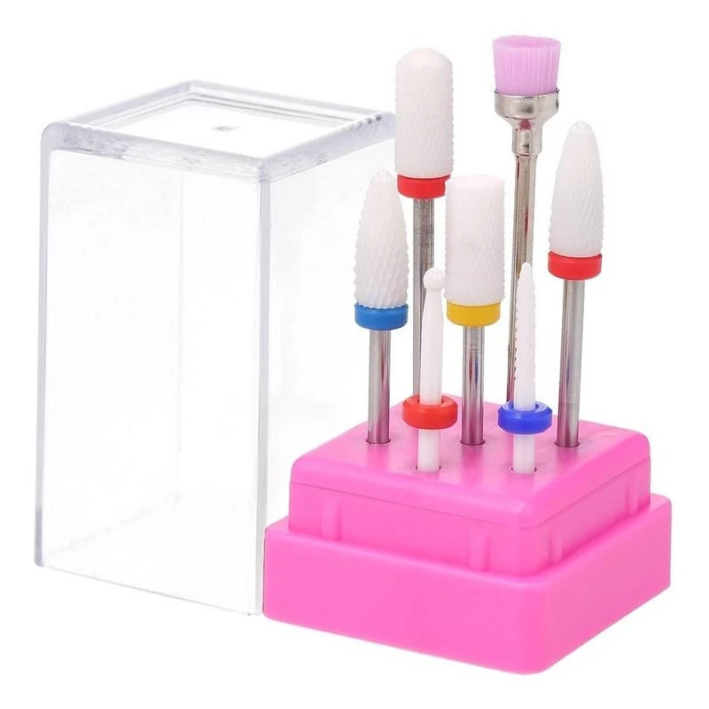 Set de 7 brocas de cerámica para uñas en diversas formas y colores con base rosada de almacenamiento y cubierta protectora transparente.