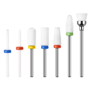 Set de 7 puntas de cerámica para torno de uñas, incluyendo diversos granos y formas con anillos de colores para manicura profesional y retiro de esmalte.