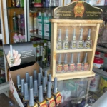 Exhibidor de madera y caja con esmaltes fortalecedores Food Nails para crecimiento, endurecimiento y prevención de descamación de las uñas.
