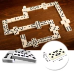 Dominoes de plástico marfil con puntos negros, juego de mesa para entretenimiento, dimensiones 4x2x0.5 cm.