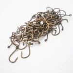 Lote de anzuelos de pesca bronce modelo Nro 4, aptos para carpas y otros peces.