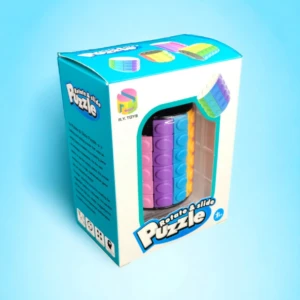 Caja de juguete "Rotate & Slide Puzzle" con un rompecabezas cilíndrico multicolor visible, para niños.