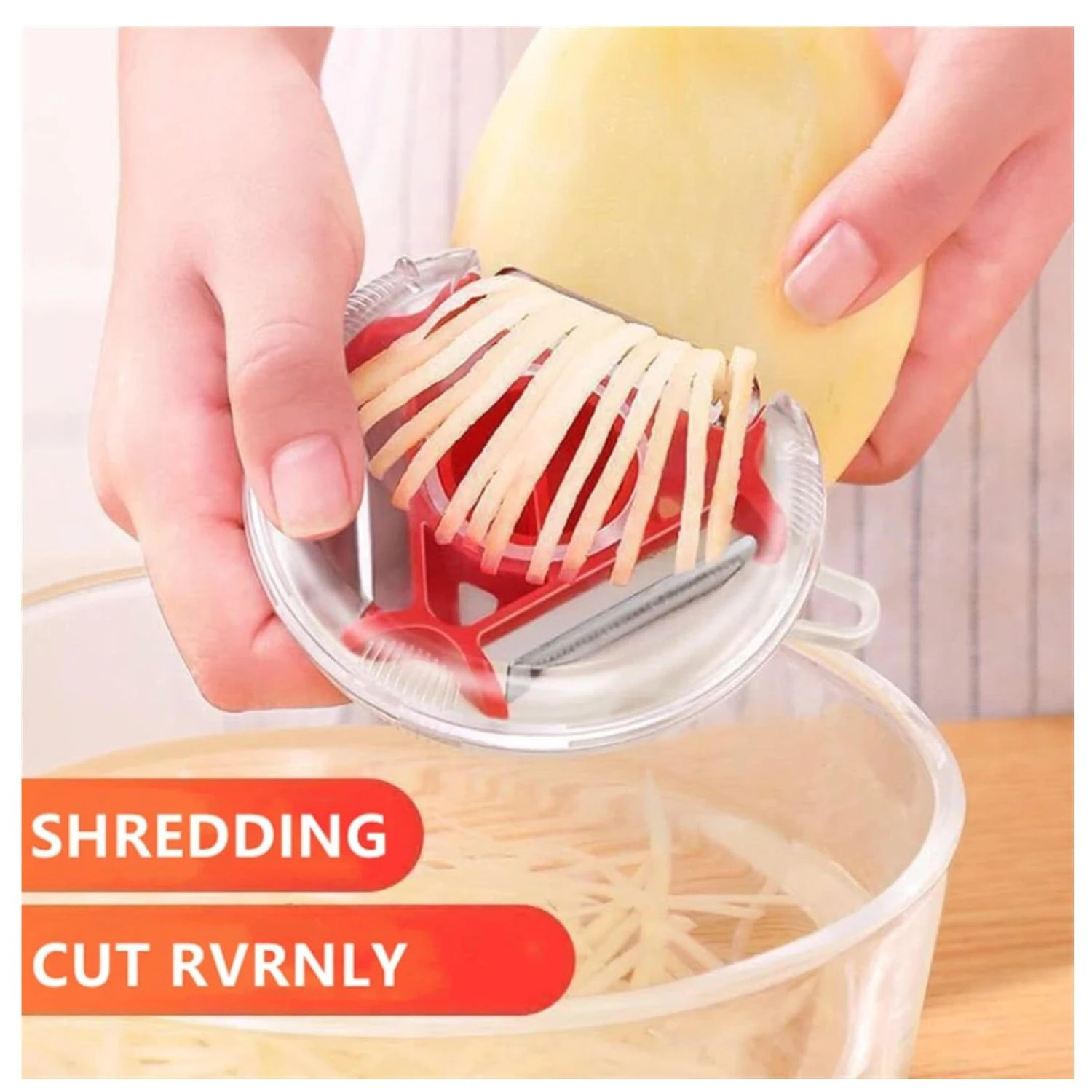 Rebanador de papas 3 en 1, en uso, cortando en tiras finas, sobre tazón de vidrio con papas cortadas.