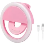 Aro de luz selfie rosa recargable para celular, con clips y cables USB.