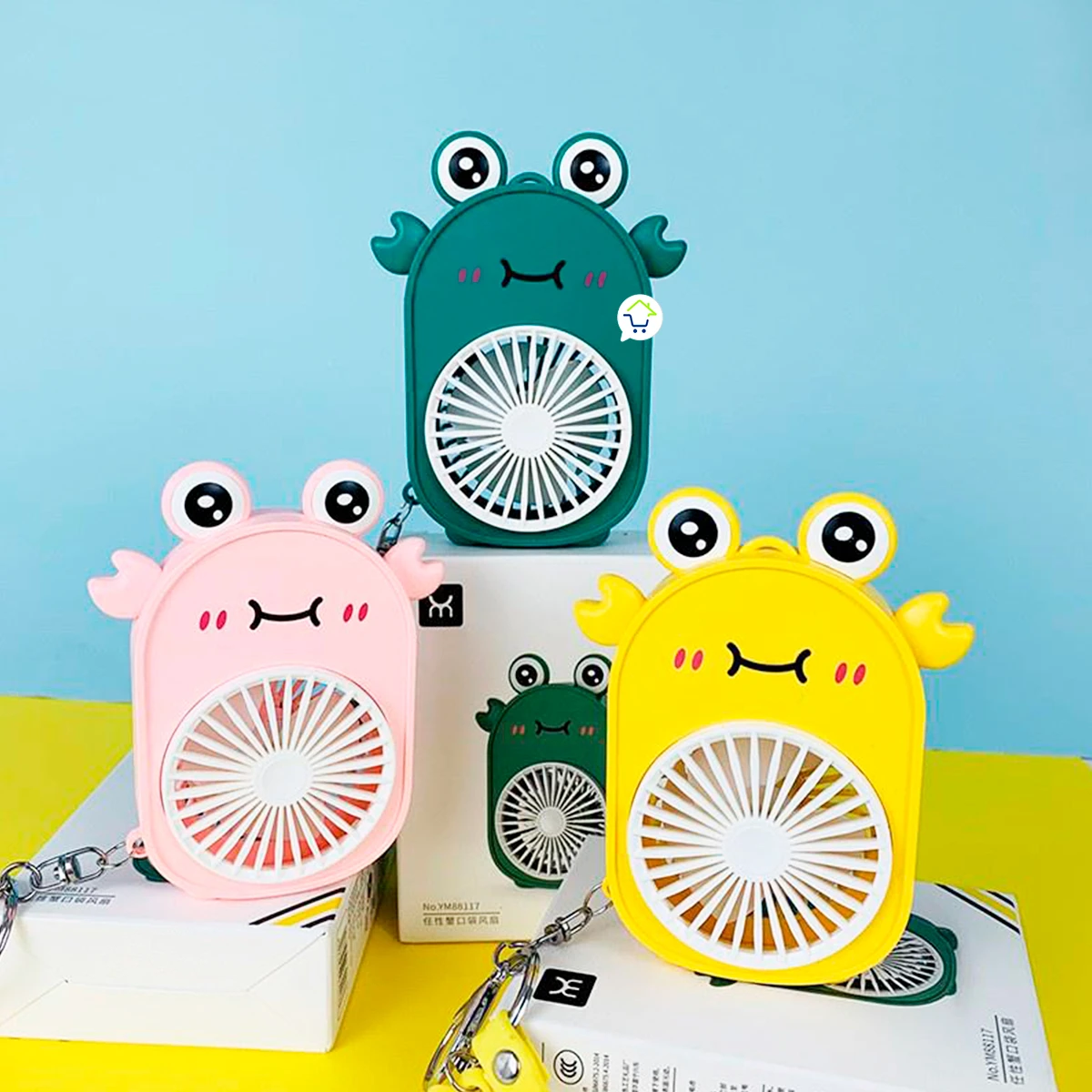 Mini ventilador portátil en forma de rana, verde, rosa y amarillo, con llavero, para abanicar.