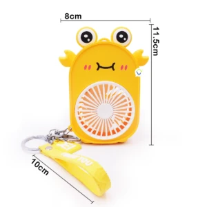 Llavero mini ventilador amarillo con forma de cangrejo y medidas 8x11.5cm.