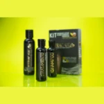 Kit alisante progresivo Keracate en fondo amarillo con caja, un champú y un tratamiento acondicionador de 60 ml cada uno dispuestos sobre superficie lisa.