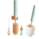 Cepillo eléctrico recargable de silicona color azul turquesa y naranja, con accesorios, ideal para limpiar botellas y tazas.