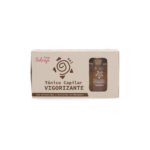 Caja con frasco de tónico capilar Fruto Salvaje vigorizante color ámbar, texto y logo Sol.