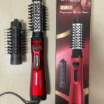 Cepillo secador alisador rojo de Shiny Beauty con mango ergonómico, un cabezal de cepillo puesto y otro intercambiable, junto a su caja original.