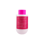 Acondicionador Esencia Salvaje con flor de Jamaica, en envase blanco con tapa rosa vibrante, texto explicativo.