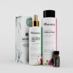 Trío Fusión Selvática: anticaída y crecimiento capilar, shampoo y tónico en envase blanco con detalles verdes y rosados.