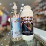 Dos botellas de Alisado Cirugía Capilar: una transparente de shampoo y otra blanca de tratamiento.