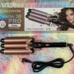 Pinza onduladora de 3 tubos color cobre con cable negro, detalle de control de temperatura y estuche para cabello.