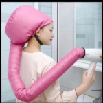 Gorro secador de cabello rosa inflable con manguera flexible que se conecta a secador manual para rizos.