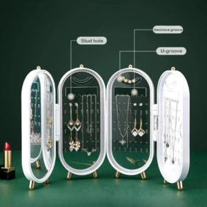 Joyero organizador de joyas blanco y transparente tipo tríptico con espejo y separadores para aretes, collares y pulseras.