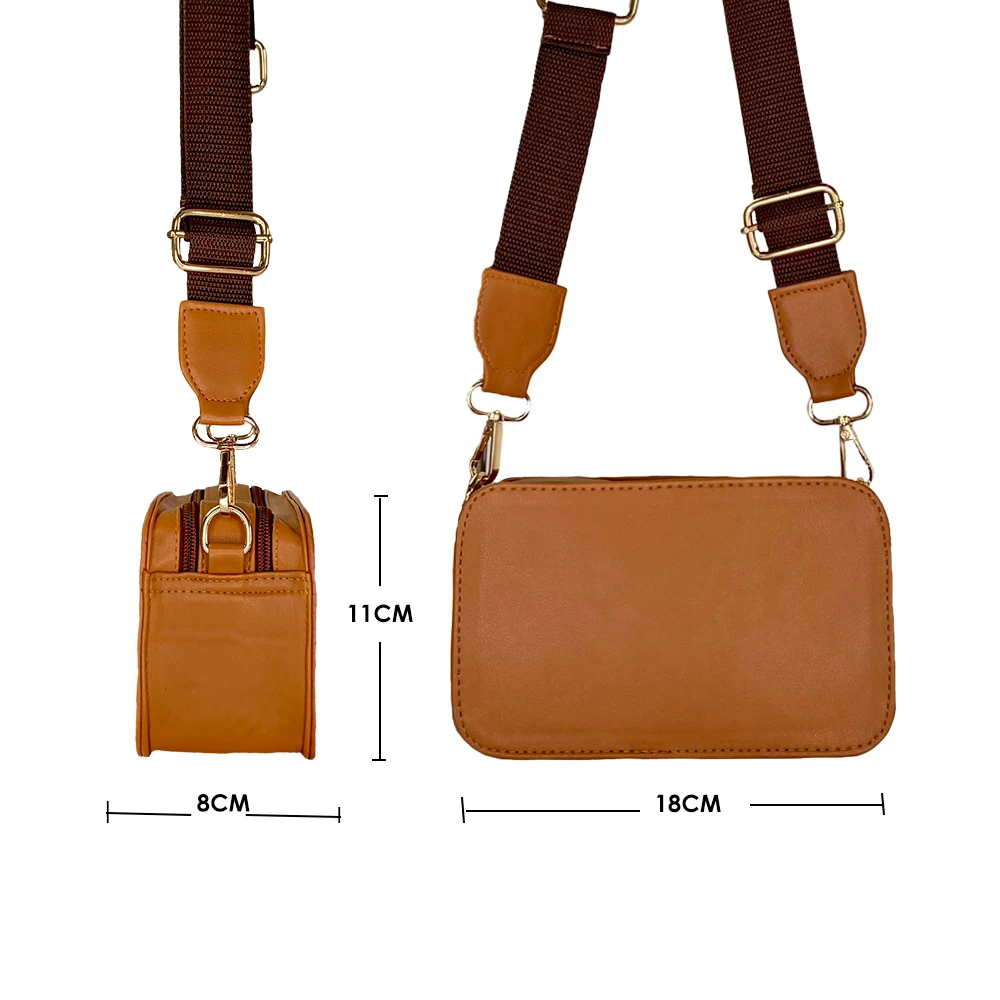 Bolso pequeño color miel con correa ajustable marrón. Dimensiones: 18cm ancho x 11cm alto x 8cm profundidad.