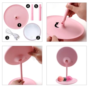 Espejo led touch inalámbrico rosa con accesorios de montaje y dos brochas de maquillaje.