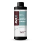 Shampoo Anyex con queratina, presentación de 400 ml, envase cilíndrico color gris y café con tapa negra, diseñado para uso profesional.