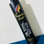 Botella negra con etiqueta dorada "French's Gold", tratamiento capilar Oil Repair 500ml.