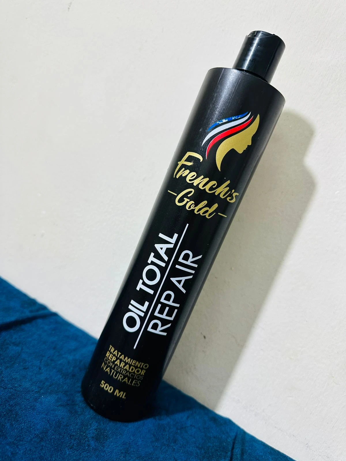 Botella negra French's Gold Oil Total Repair 500ml. Tratamiento reparador con extractos naturales.