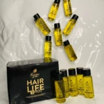 Caja negra con 12 ampolletas de aceite capilar "Hair Life Shot" French's Gold, para brillo y suavidad.