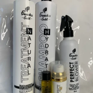 Set de productos para cabello French's Gold: shampoo, tratamiento, protector térmico y ampolleta.
