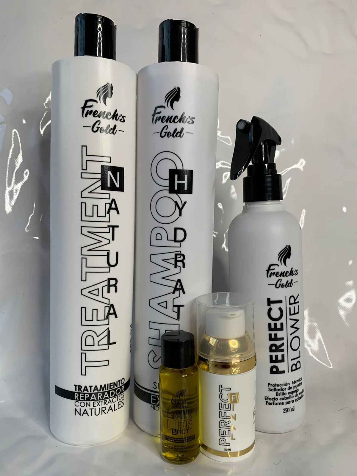 Kit de aseo capilar French's Gold: Shampoo, Treatment, Spray y ampollas anticaída.