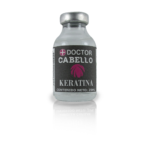 Ampolla de 25 ml de keratina Doctor Cabello en frasco de vidrio transparente con tapa metálica y etiqueta negra con logotipo rosa.