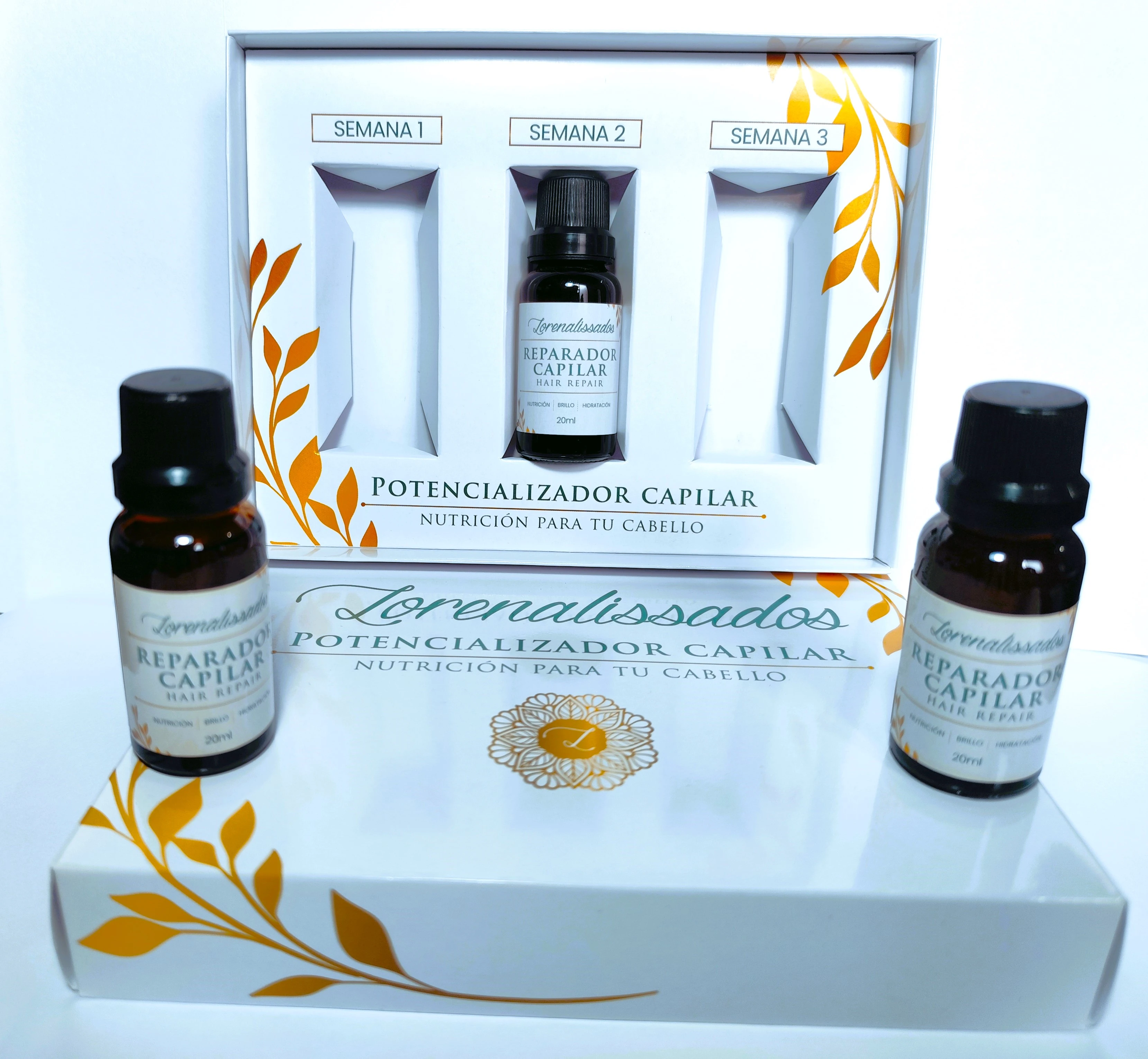 Set de tratamiento capilar Lorenza Lissados: 3 ampollas y 2 frascos de serum reparador con detalles dorados.